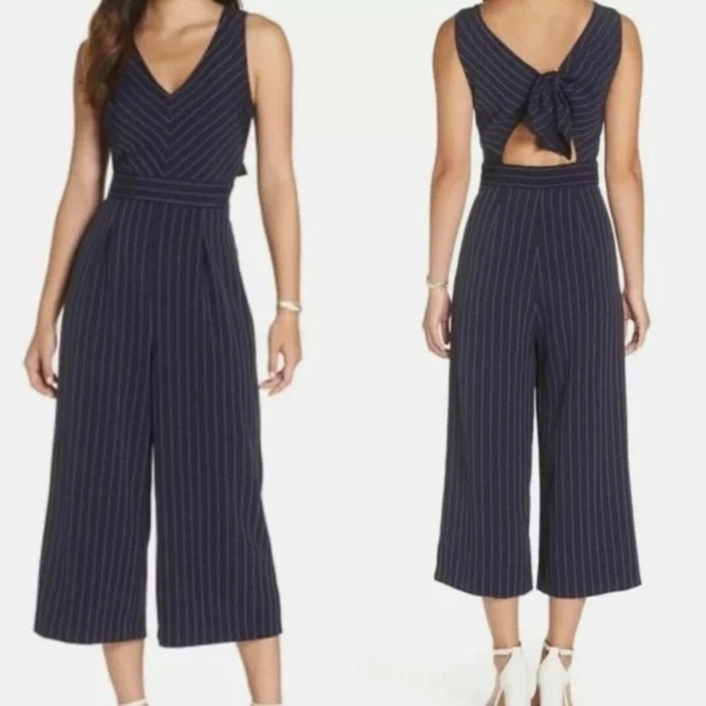 1901 rare classic jumpsuit pockets navy feminine subtle bow open cutout in back